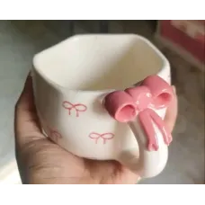 The Earthy Store Ceramic Pink Bow Printed Coffee Bow Hundle Print Ceramic Coffee Mug  (150 ml)