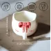 The Earthy Store Ceramic Pink Bow Printed Coffee Bow Hundle Print Ceramic Coffee Mug  (150 ml)