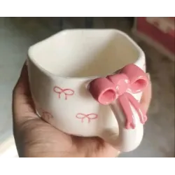 The Earthy Store Ceramic Pink Bow Printed Coffee Bow Hundle Print Ceramic Coffee Mug  (150 ml)